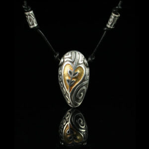 Abstract heart enamel design on a silver pendant