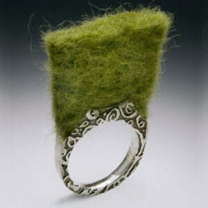 Silver ring with green felt design