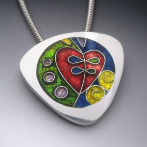 Abstract heart enamel design on a silver pendant