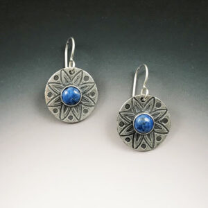 Silver circle earrings with mandala design and blue stone center