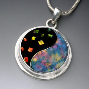 Abstract enamel opal design on a silver pendant