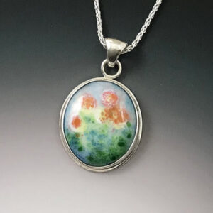 Silver necklace with abstract enamel flower design