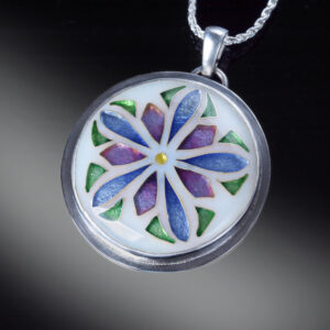 enamel pendant with mandala design